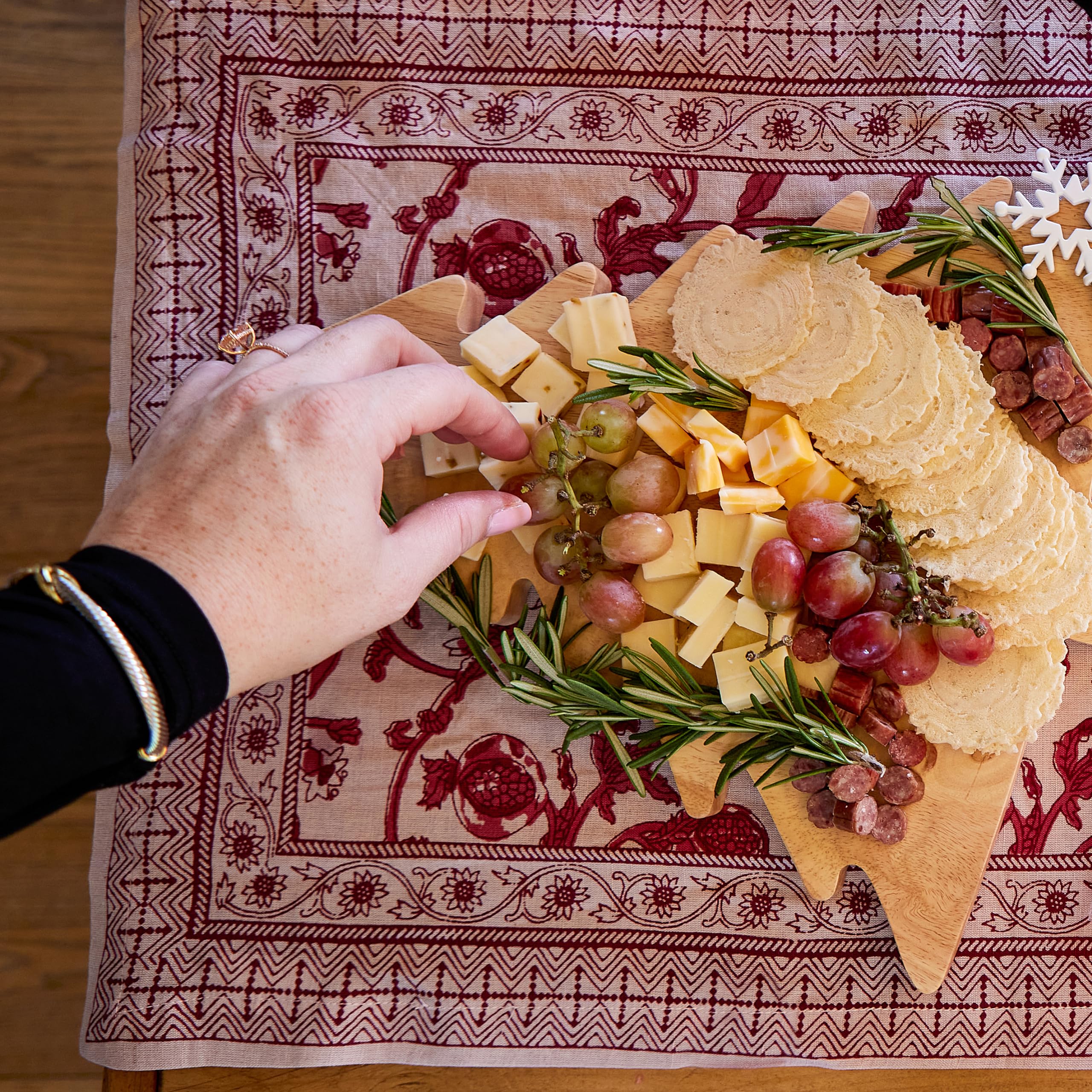 34° crisp held in hand showing thin size and easy portability
