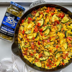 505 Southwestern spooned over enchiladas adding smoky medium heat and rich flavor