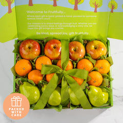 A Gift Inside hand-holding mandarins and apples, demonstrating size and shareability