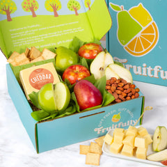 A Gift Inside basket next to common items for scale to show generous contents