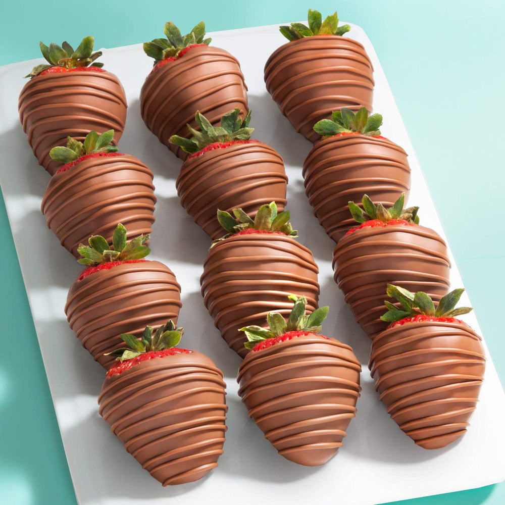 A Gift Inside close-up of individual strawberries highlighting freshness and juiciness