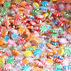close-up of A Great Surprise pinwheel candy texture highlighting bright fruit-colored swirls and gloss