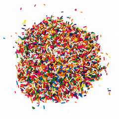 A Great Surprise close-up of jimmies texture highlighting vivid rainbow colors