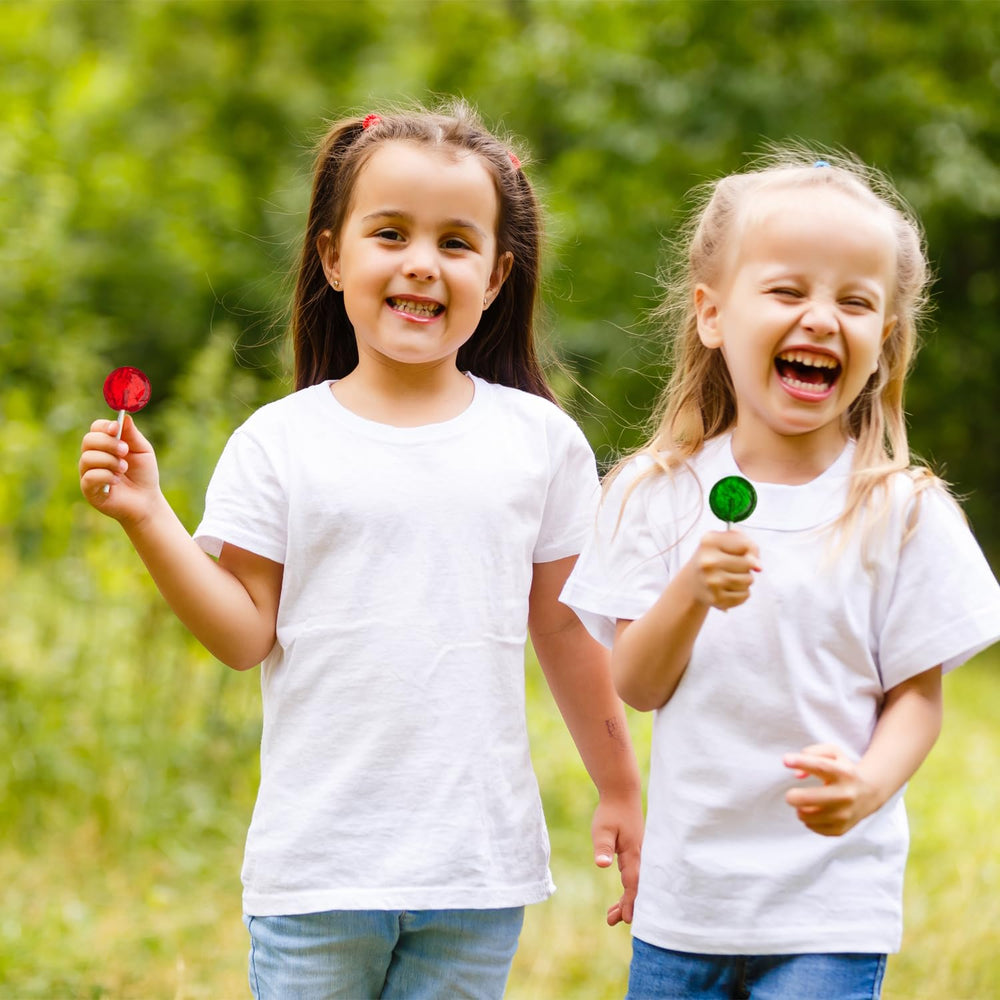 A Great Surprise lollipop held in hand to show size and portion control