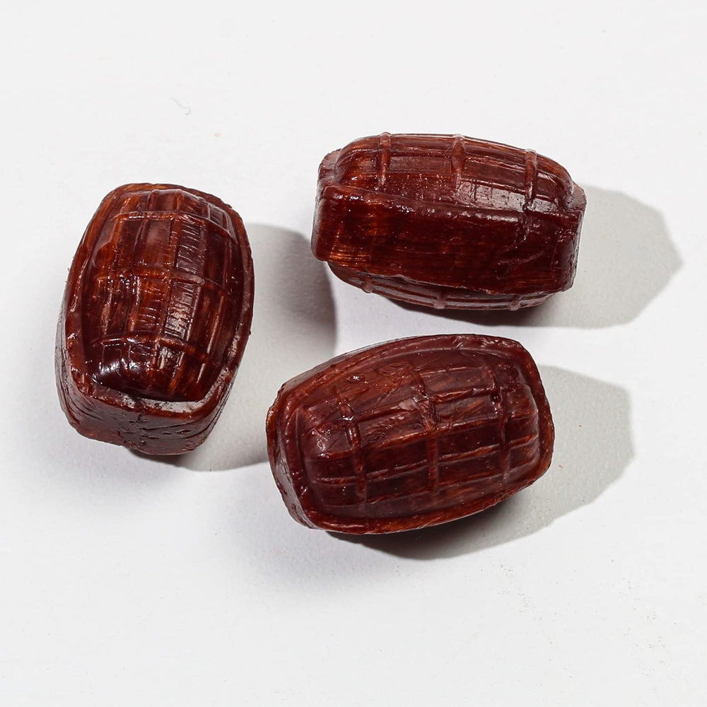 A Great Surprise root beer candy close-up showing smooth texture and melt-in-mouth appeal