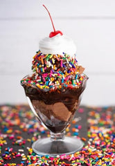 A Great Surprise sprinkles topping a frosted cupcake for instant party appeal