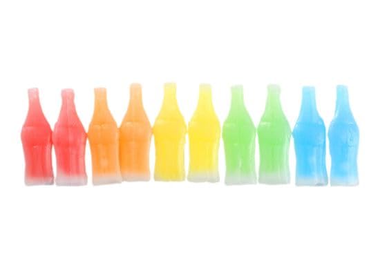 Serving bowl of A Great Surprise wax bottles at a candy buffet offering easy grab-and-go treats
