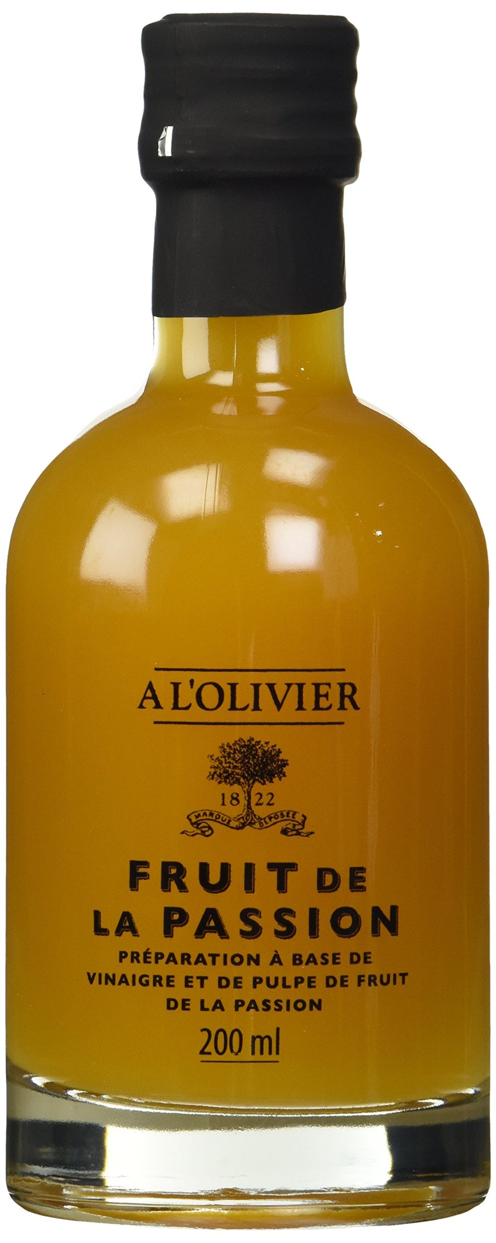 A L'Olivier front bottle showing label and elegant glass, highlights premium French origin