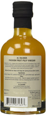 A L'Olivier close-up of passion fruit pulp texture, shows thick fruity body for dressings