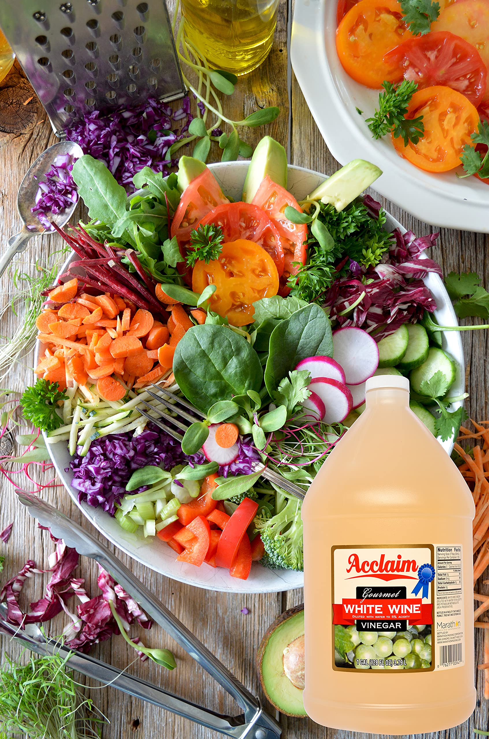 Acclaim white wine vinegar next to fruit and measuring cup showing gallon scale for value