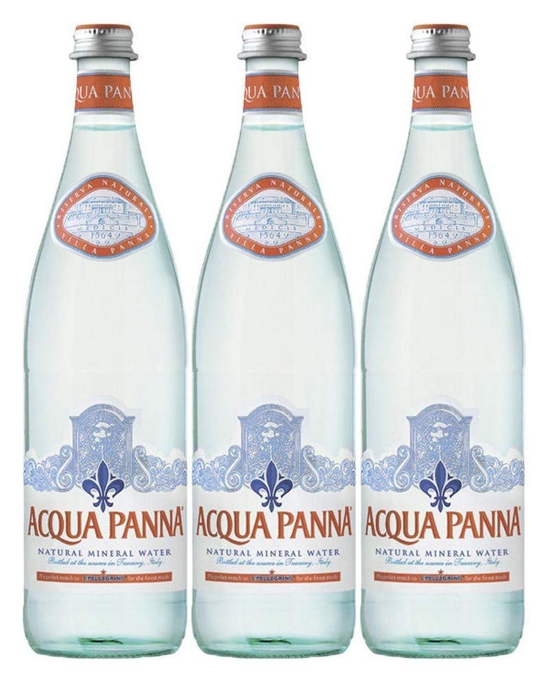 Acqua Panna glass bottle front view on table, elegant presentation