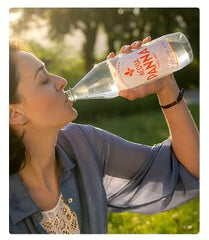 Acqua Panna water poured into a glass illustrating clear, smooth texture for palate cleansing