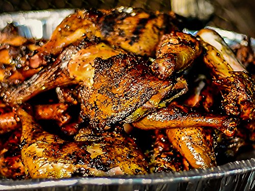 Adkins in smoker with hickory and mesquite chips demonstrating smoky flavor infusion