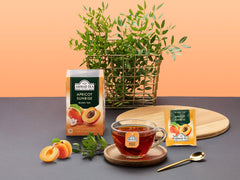 Ahmad Tea brewed cup with apricot aroma for a flavorful sip benefit