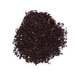Ahmad Tea measuring spoon with loose leaves to show portioning accuracy