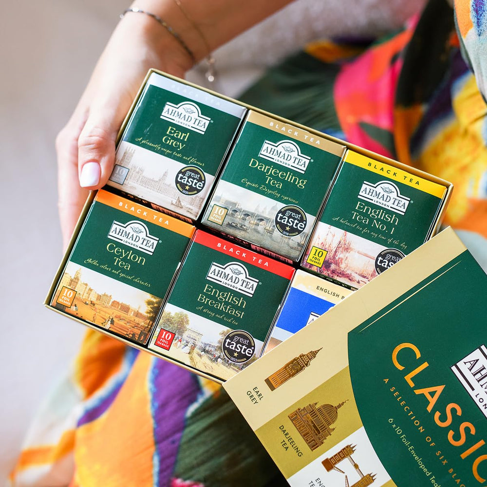 Ahmad Tea pouring brewed cup in lifestyle setting showing rich color and serving suggestion