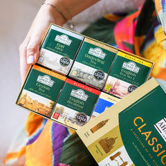 Ahmad Tea pouring brewed cup in lifestyle setting showing rich color and serving suggestion