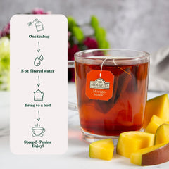 Ahmad Tea brewed hot cup, Mango Magic delivering warm fruity aroma