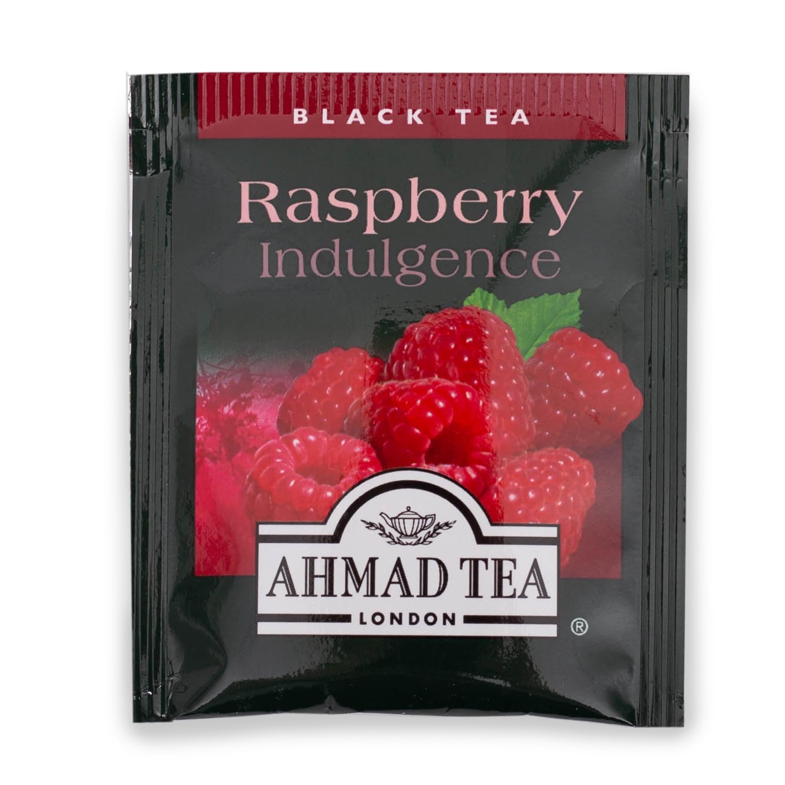 Ahmad Tea close-up of raspberry pieces and black tea leaves highlighting real fruit inclusion