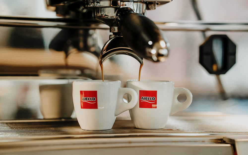 Aiello Caffè espresso shot with crema illustrating rich body and balanced flavor