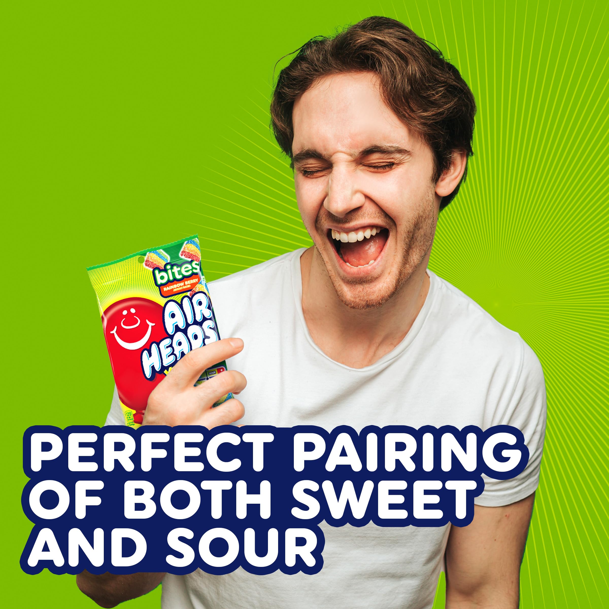Hand holding single Airheads Xtremes bite showing portion and easy snacking