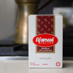 Al Ameed coffee powder texture close-up revealing grind suited for multiple brewing methods