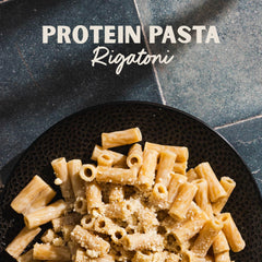 AL DENTE rigatoni twirled on fork with sauce showing satisfying serving