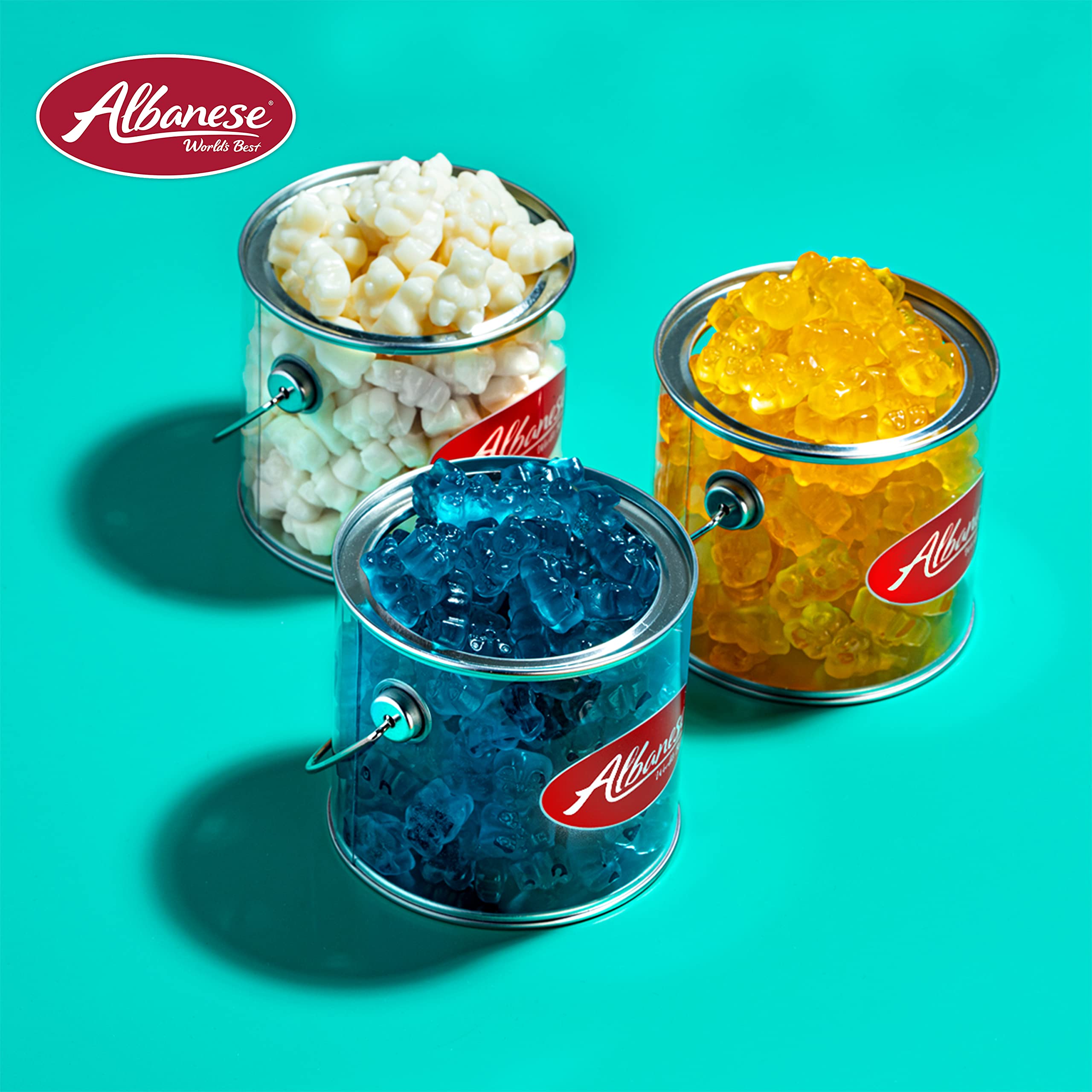 Albanese hand holding gummi bears to show portion size and easy serving