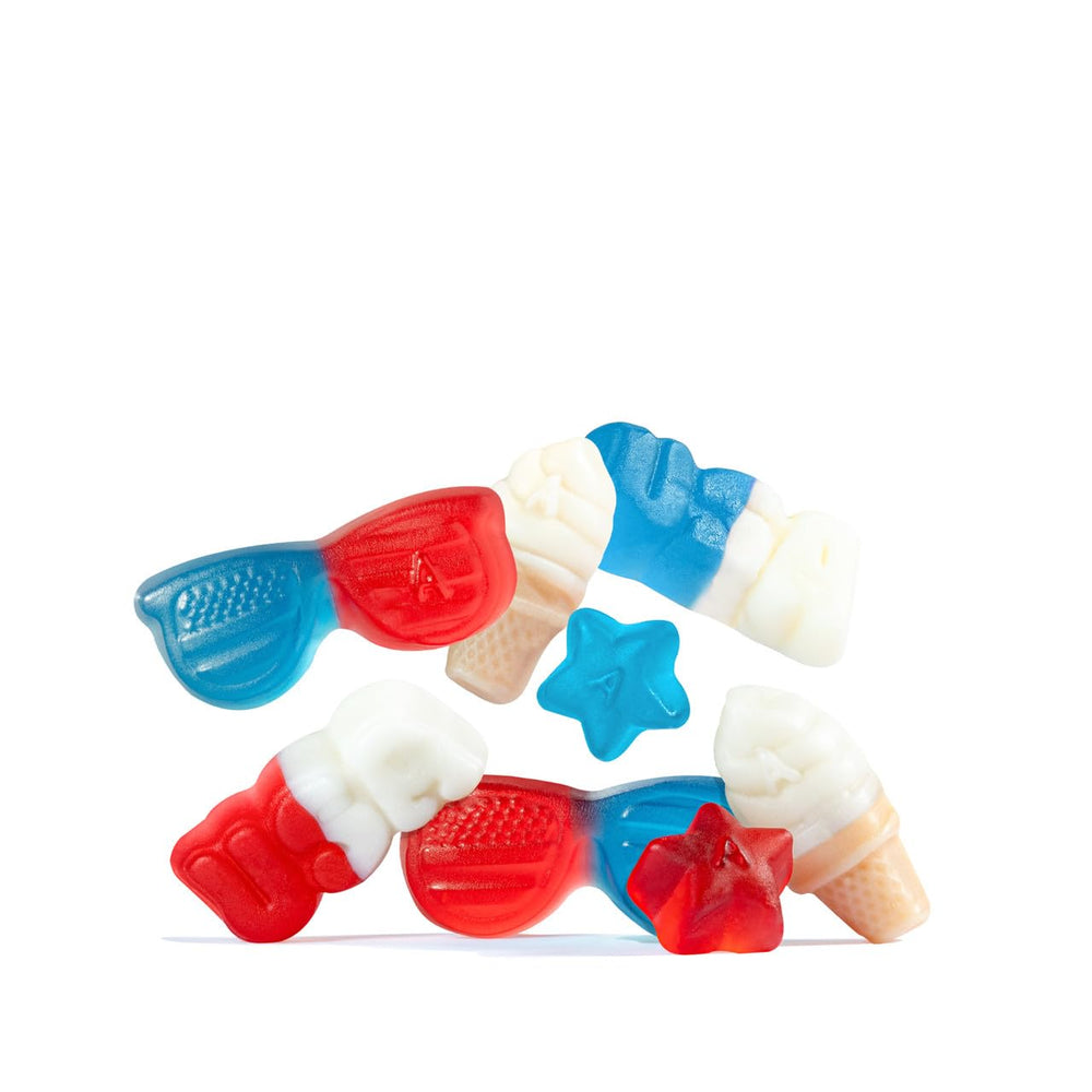 Albanese hand holding gummies to show scale and portion size for sharing