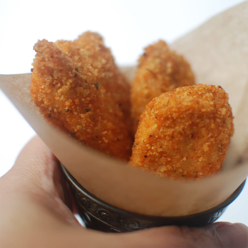 ALEIAS BEST. TASTE. EVER. kitchen scene with plated crispy food for family serving
