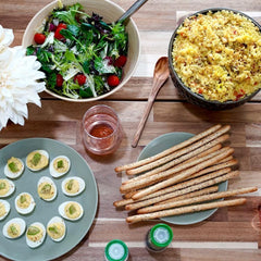 Alessi breadstick dipped in hummus showing dipping compatibility