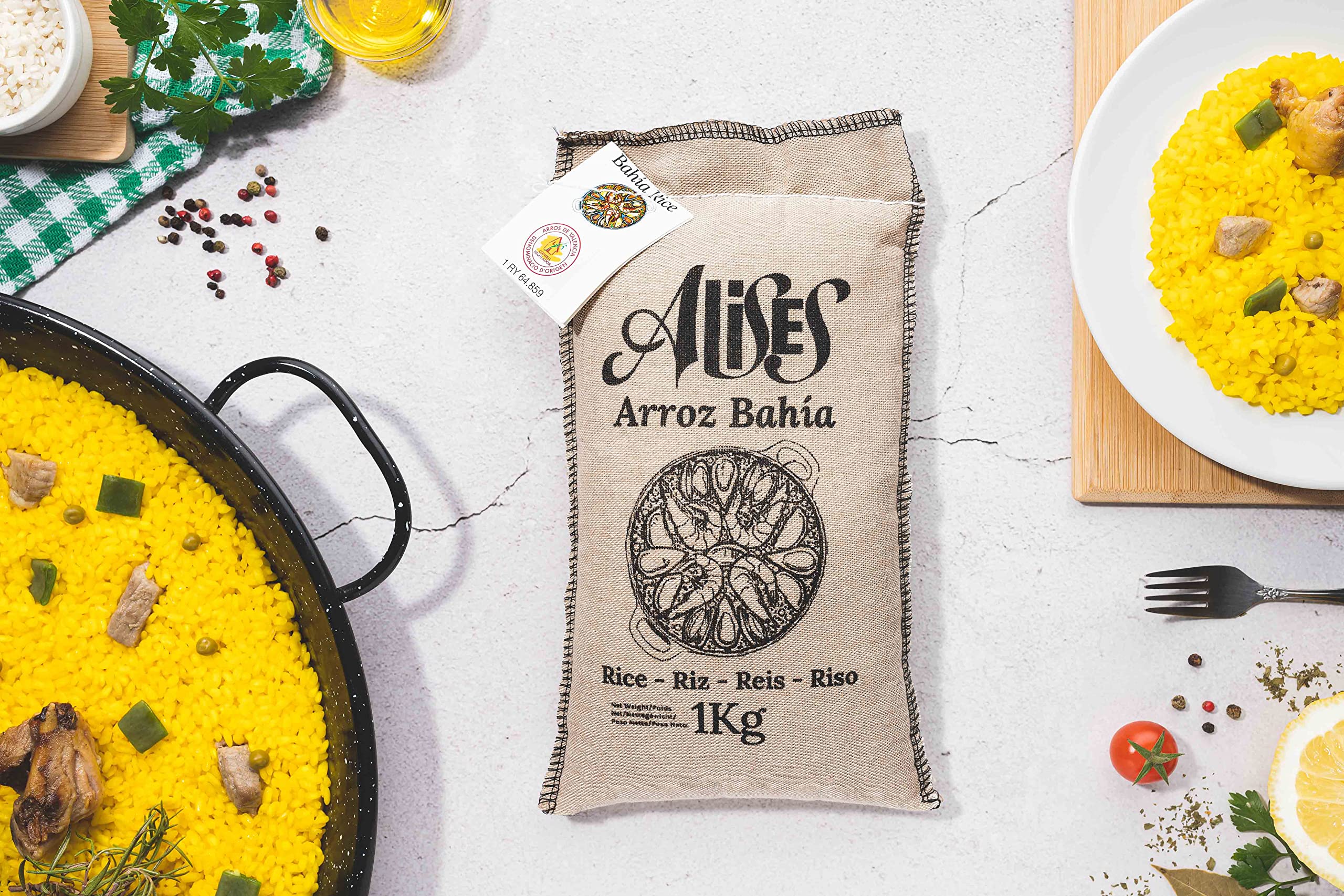Family enjoying paella in kitchen using Alises rice to showcase authentic dining