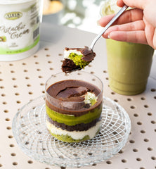 Alkis label close-up with visible pistachio pieces for authentic flavor