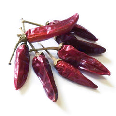 Alma Gourmet peppers infusing olive oil creating spicy flavored oil for cooking