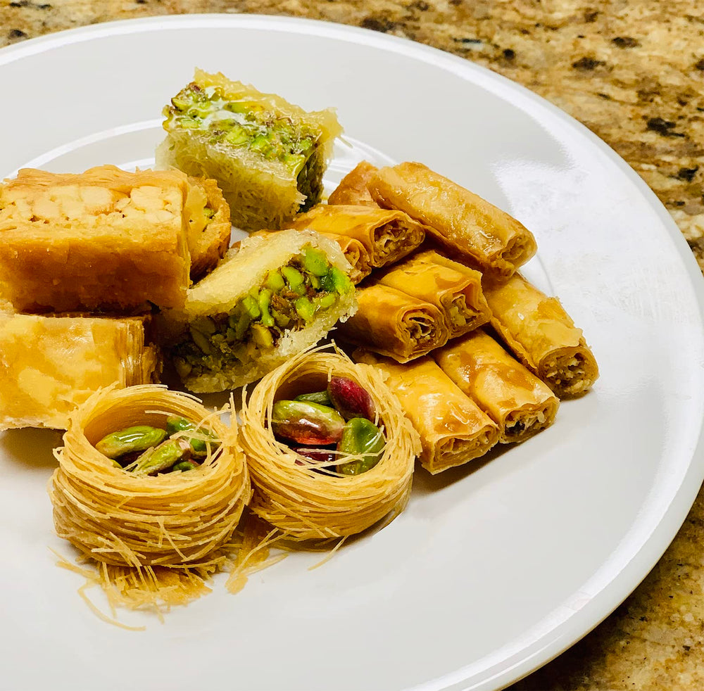 Alreef baklava next to a coffee cup for size comparison and portion guidance benefit