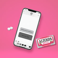 Hand holding Altoids tin showing compact size for carry and convenience