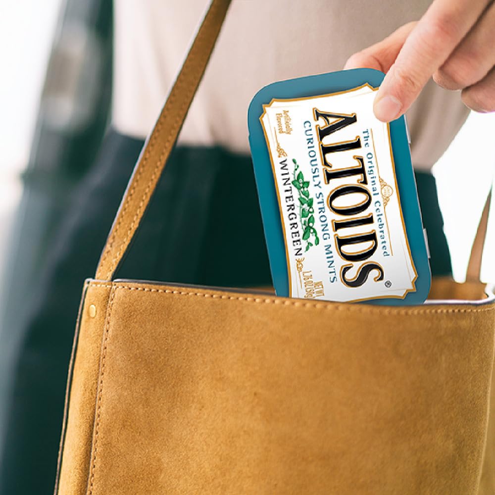 Altoids tin on an office desk conveying convenience before meetings