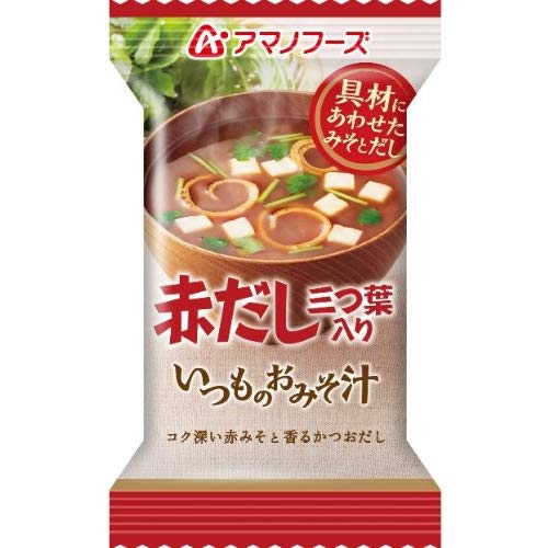 Amano sachet next to a standard mug showing serving size and portion convenience
