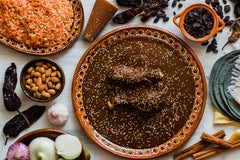 Amazing Chiles & Spices powder next to mole ingredients, accelerates sauce prep