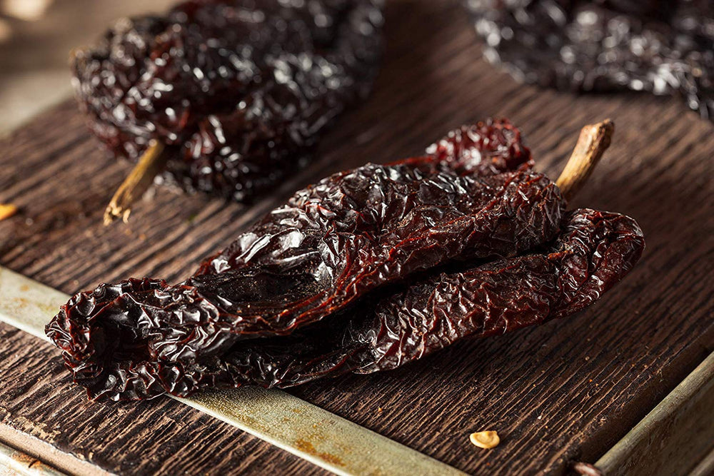 Amazing Chiles & Spices teaspoon scoop of ancho powder, simple measuring benefit