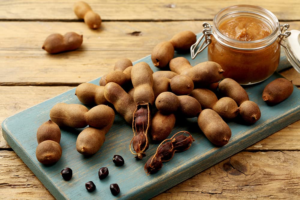 Amazing Chiles & Spices tamarind pods being used in a kitchen for sauces and marinades