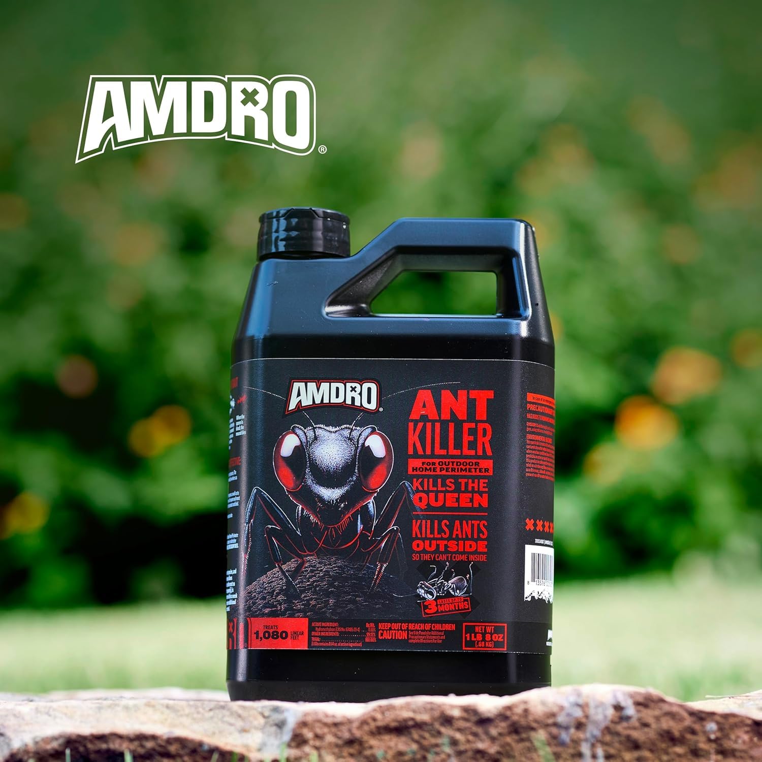 Amdro Ant Block placed on garden mulch demonstrating targeted outdoor use benefit
