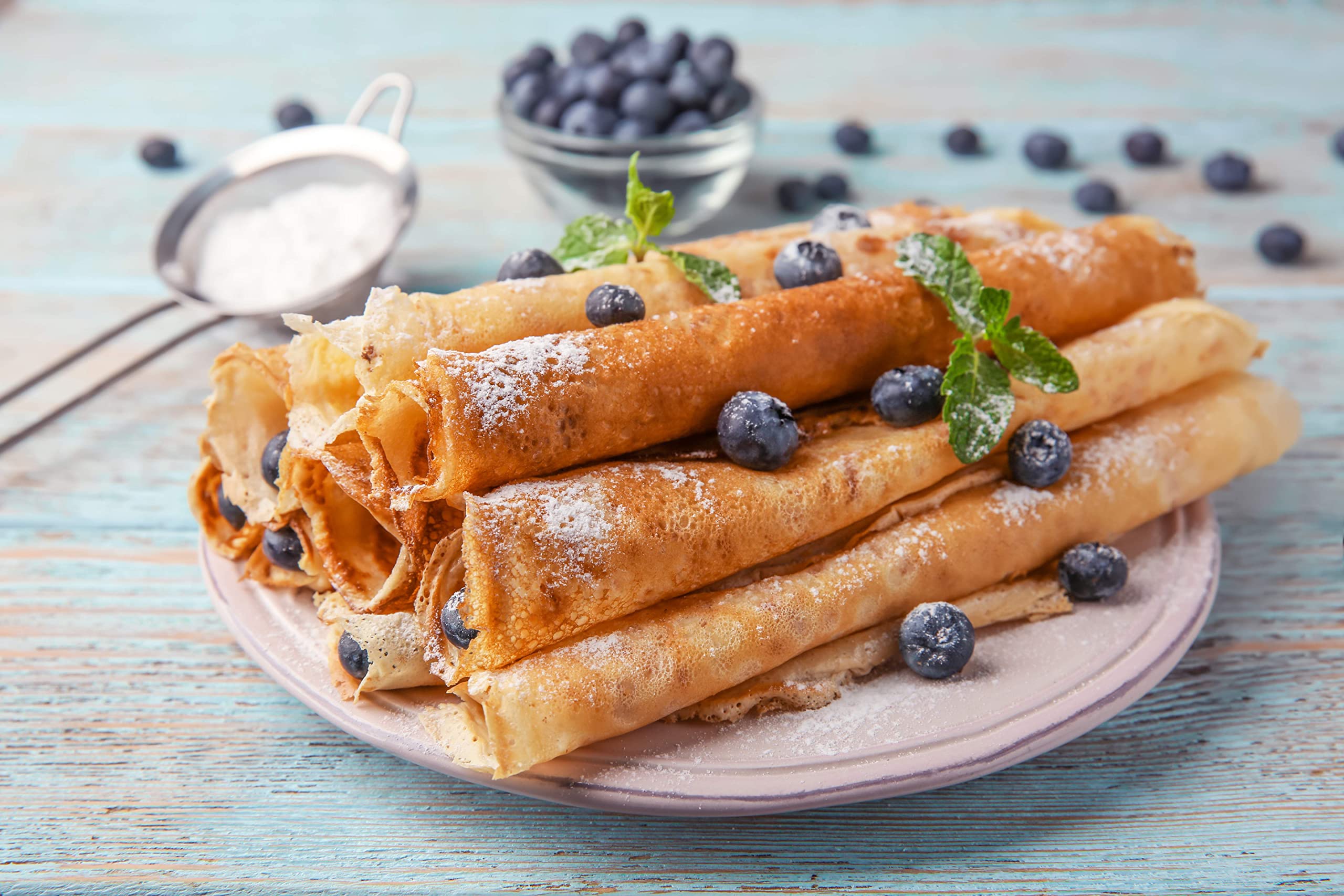American Table served crepe with fresh fruit showing versatile serving options