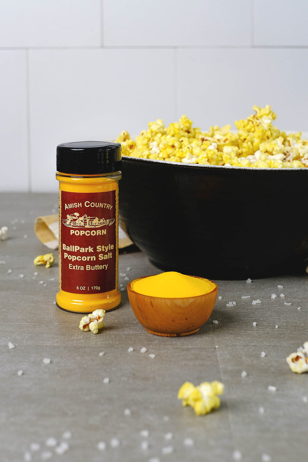 Amish Country Popcorn seasoning sprinkled on popcorn bowl for instant taste boost