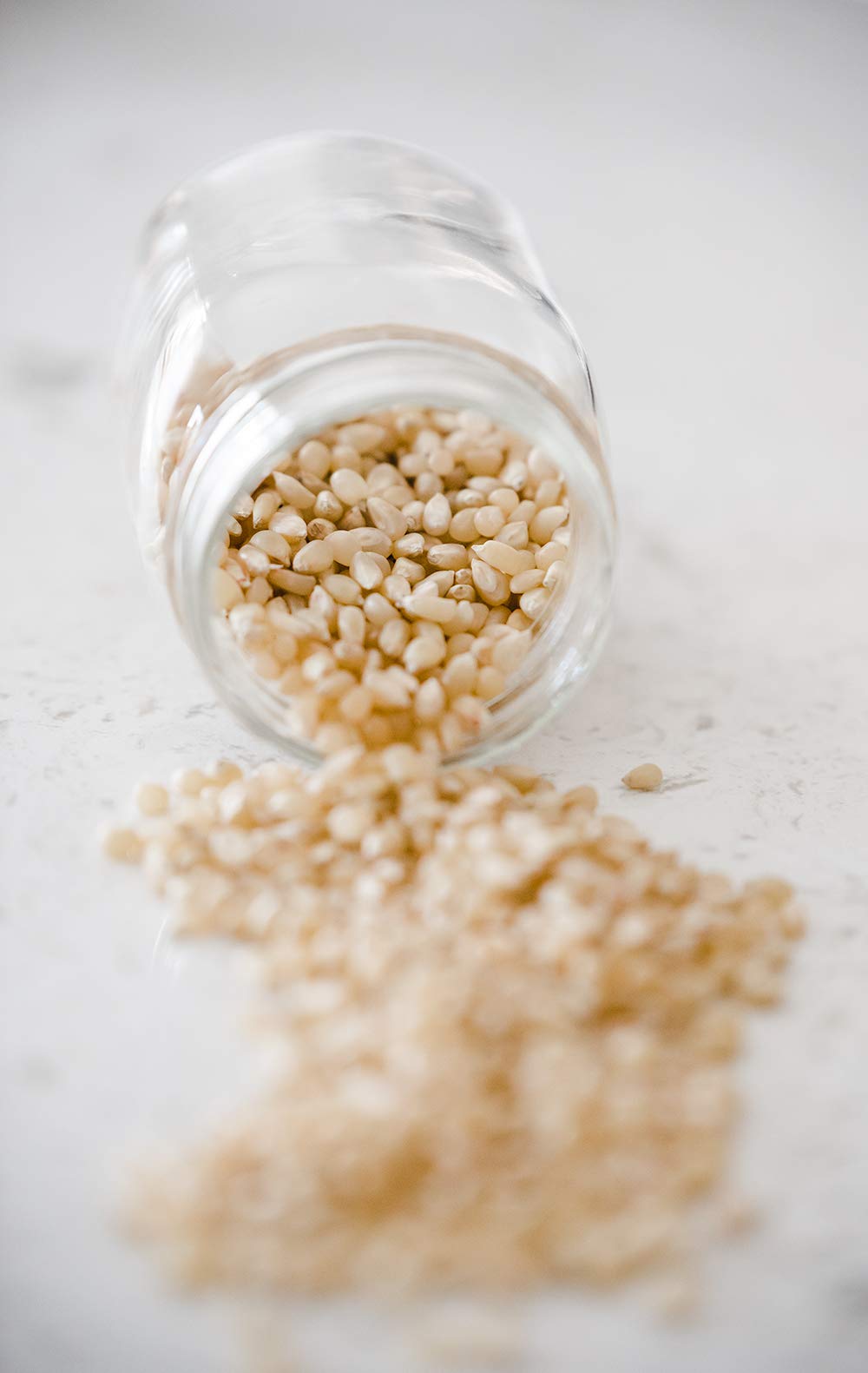 Amish Country Popcorn next to a measuring cup showing portion size and yield clarity