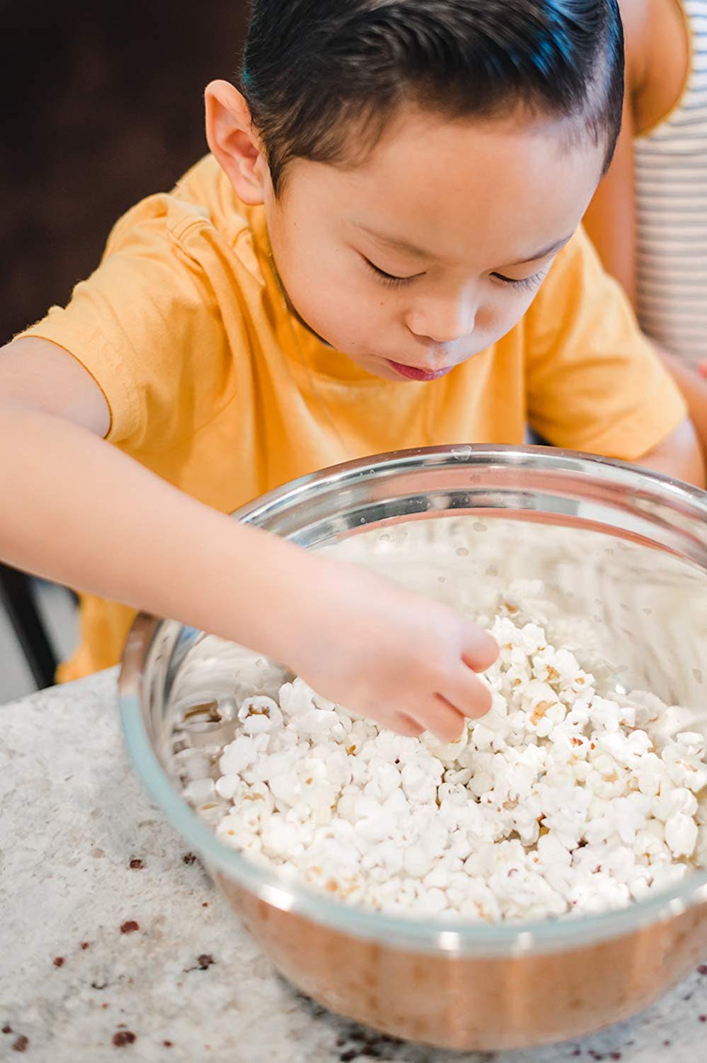 Amish Country Popcorn stored in airtight glass container to preserve freshness and popping quality