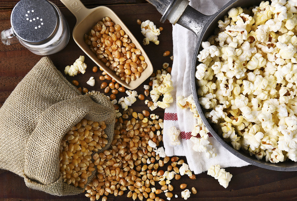 Two Amish Country Popcorn jars stored on pantry shelf for long-term freshness benefit