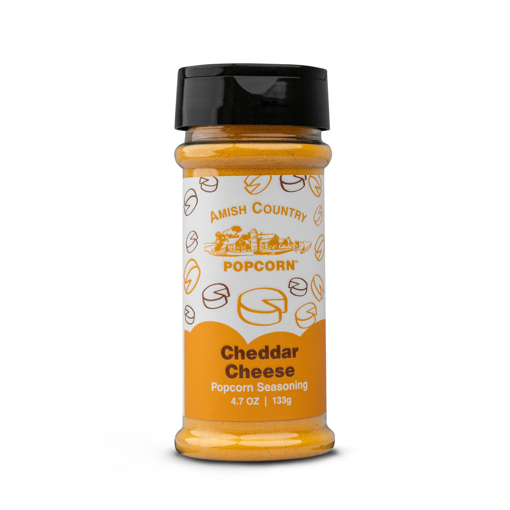 Amish Country Popcorn cheddar texture sprinkled on popcorn for bold taste