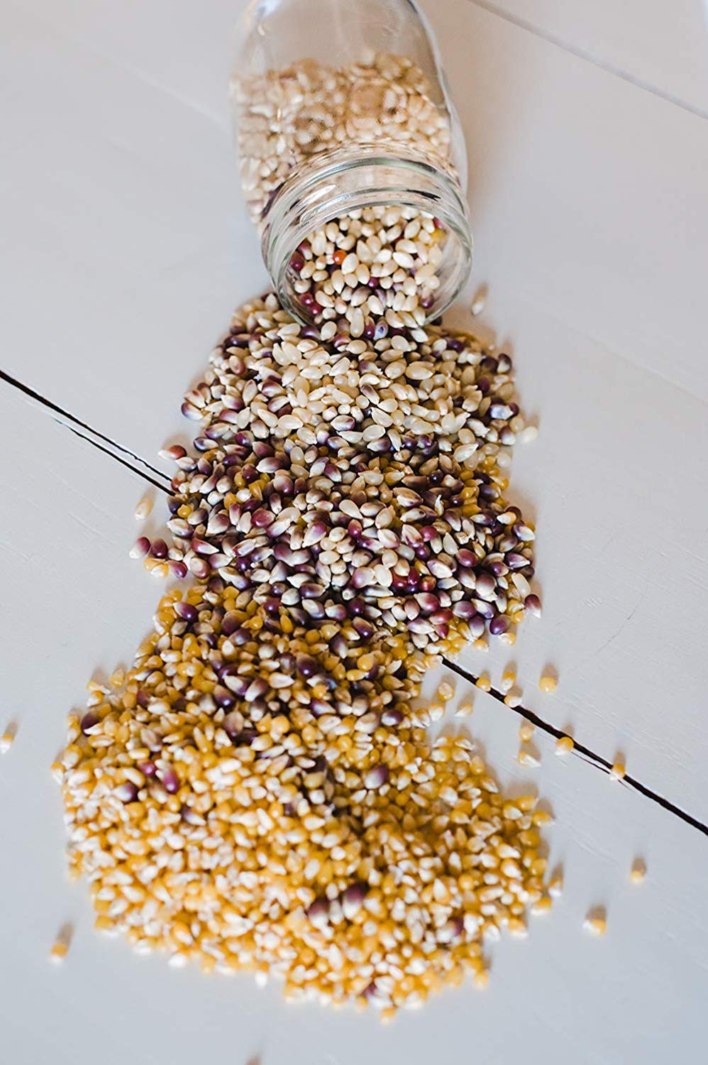 Amish Country Popcorn three bags laid out to show variety and convenient assortment benefit
