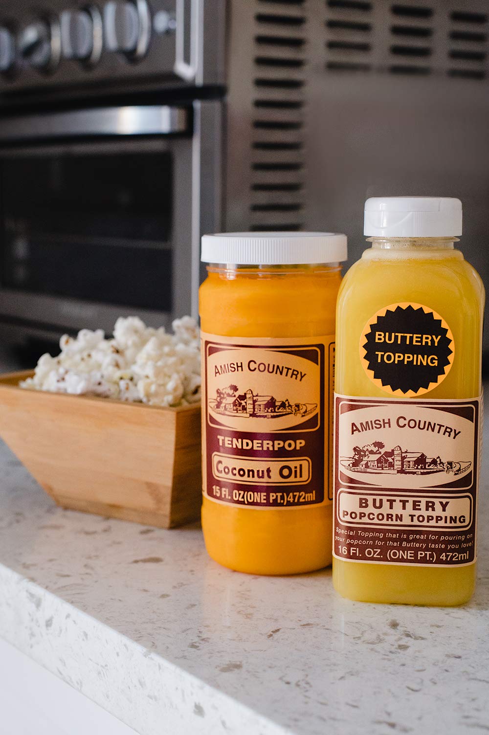 Amish Country Popcorn buttery topping drizzled over popcorn for even flavor coverage